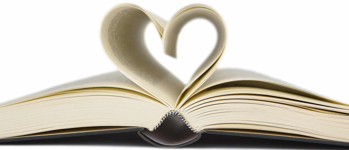 Open book with heart shaped pages. Love for reading. Isolated